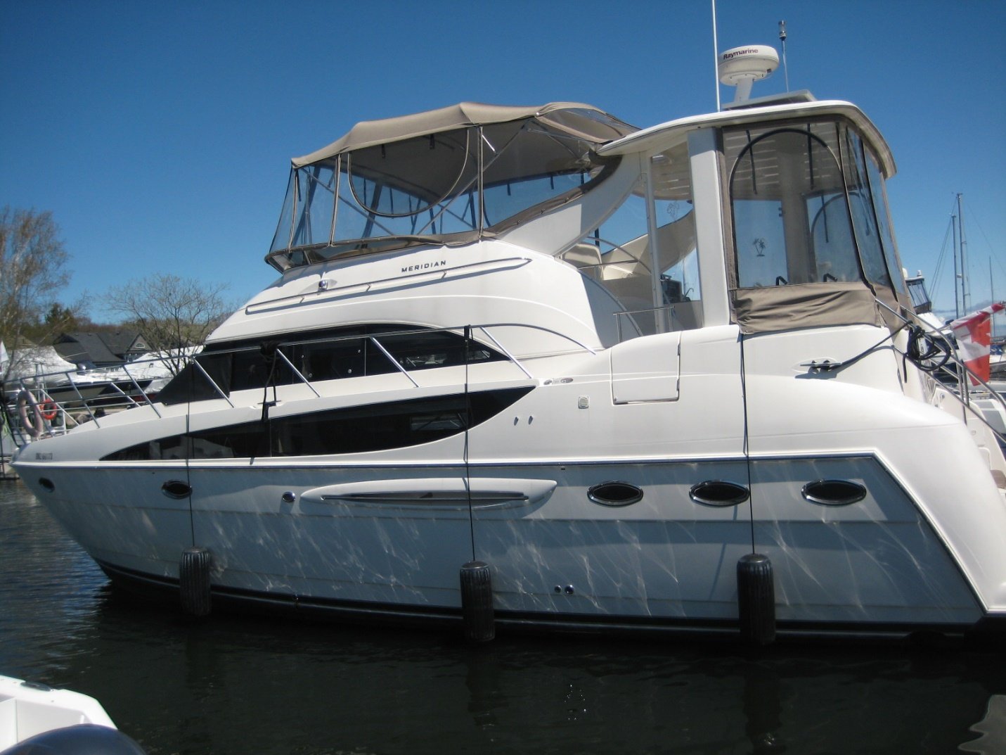 Powerboat in water at dockside